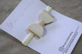 Baby haarbandje "strik wit / beige"