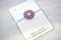 Baby haarbandje "Leather flower paars - wit"