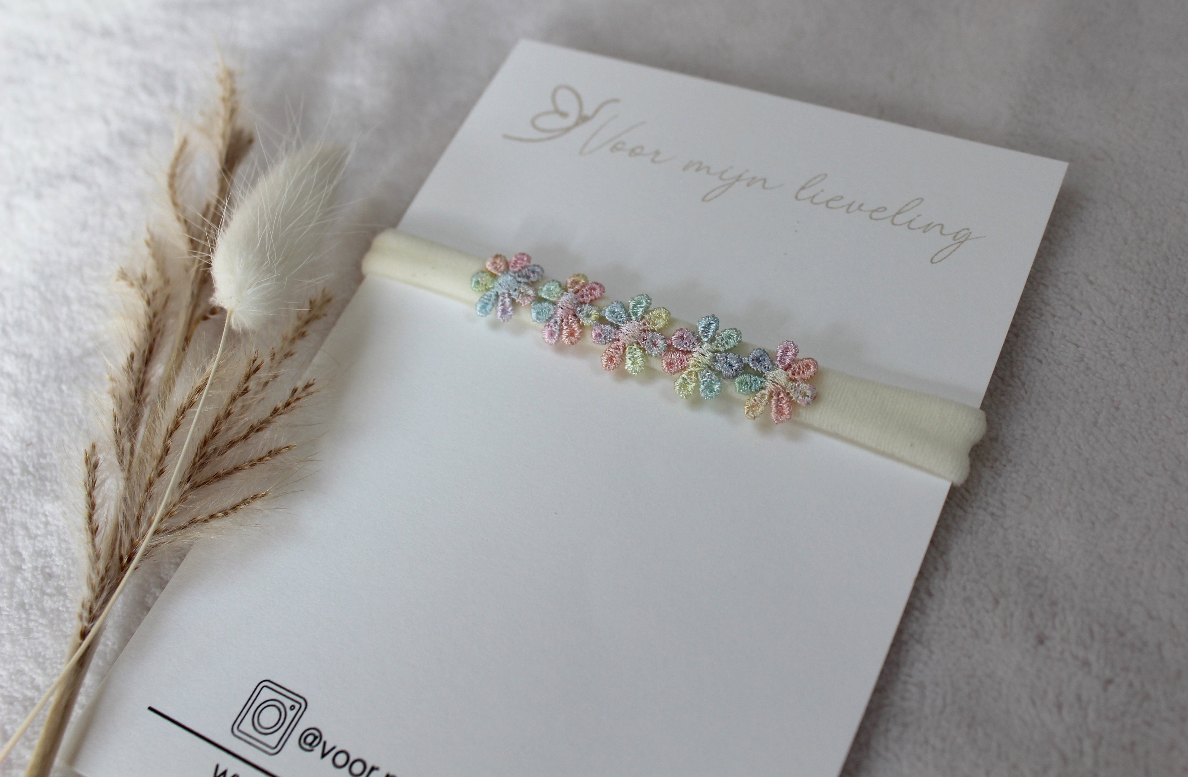 Baby haarbandje "Mini flower pastel"